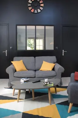 Coin salon dans l'établissement Le loft du Clos d'Esquay