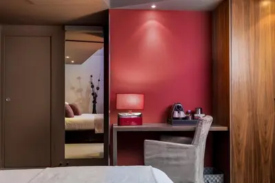 Un ou plusieurs lits dans un hébergement de l'établissement Hotel Restaurant Spa Ivan Vautier