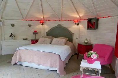 Un ou plusieurs lits dans un hébergement de l'établissement La Naomath - Maison d'hôtes, Hébergement insolite & Gîte