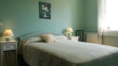 Un ou plusieurs lits dans un hébergement de l'établissement Gîtes sains Baie du mont saint Michel LES HORTENSIAS