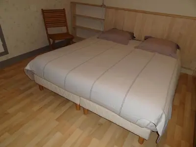 Un ou plusieurs lits dans un hébergement de l'établissement les Voiries chambres d'hotes