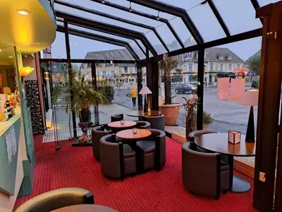 Coin salon dans l'établissement Hôtel Le Phare