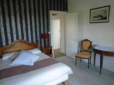 Un ou plusieurs lits dans un hébergement de l'établissement Maison des Isles