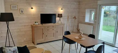 Télévision ou salle de divertissement dans l'établissement Gîte Le Val de Marigny 2 personnes