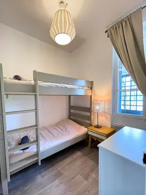 Un ou plusieurs lits dans un hébergement de l'établissement Villa LES MYRTILLES