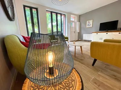 Télévision ou salle de divertissement dans l'établissement Villa LES MYRTILLES