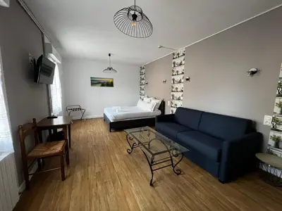 Un ou plusieurs lits dans un hébergement de l'établissement Contact Hotel Les Montois
