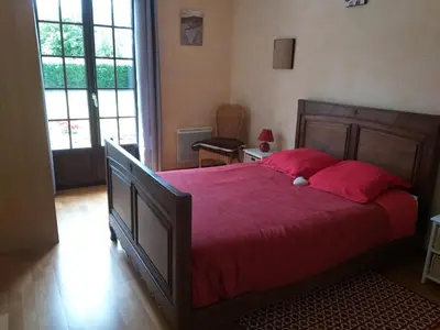 Un ou plusieurs lits dans un hébergement de l'établissement Maison de vacances