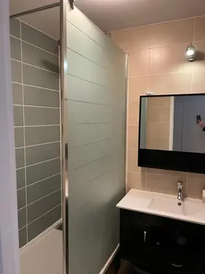 Salle de bains dans l'établissement Appartements Caen Centre