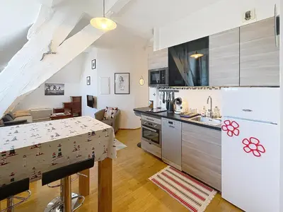 Cuisine ou kitchenette dans l'établissement Appartement cosy, 200m plage, parking privé, WiFi - FR-1-361-18