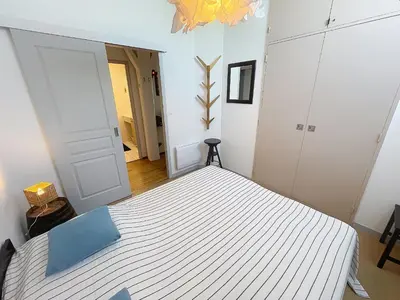 Un ou plusieurs lits dans un hébergement de l'établissement Appartement cosy, 200m plage, parking privé, WiFi - FR-1-361-18