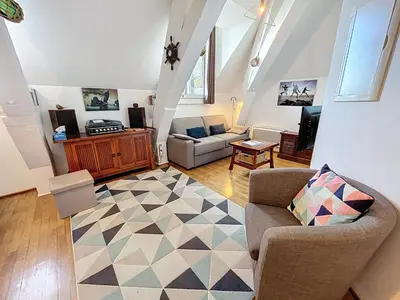 Télévision ou salle de divertissement dans l'établissement Appartement cosy, 200m plage, parking privé, WiFi - FR-1-361-18