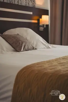 Un ou plusieurs lits dans un hébergement de l'établissement Hotel Chantereyne