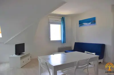 Télévision ou salle de divertissement dans l'établissement Adonis Grandcamp - Résidence Les Isles De Sola