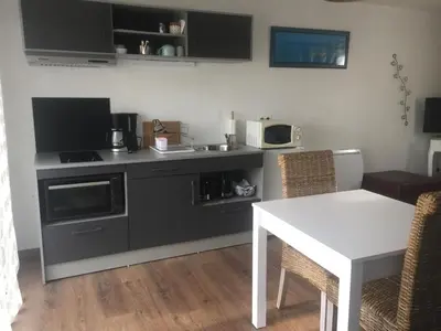 Cuisine ou kitchenette dans l'établissement Les Charmilles