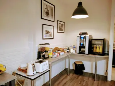 Cuisine ou kitchenette dans l'établissement Hôtel Le Vauban
