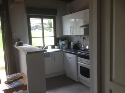 Cuisine ou kitchenette dans l'établissement La grange de la vallée