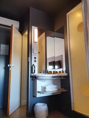 Cuisine ou kitchenette dans l'établissement ibis budget Saint Lô