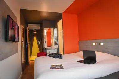 Un ou plusieurs lits dans un hébergement de l'établissement ibis budget Saint Lô