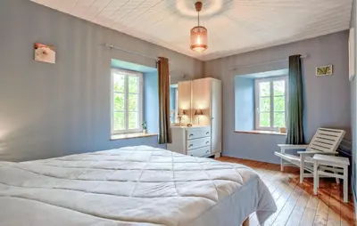 Un ou plusieurs lits dans un hébergement de l'établissement 4 Bedroom Cozy Home In Monthuchon