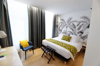 Un ou plusieurs lits dans un hébergement de l'établissement Hôtel Moderna