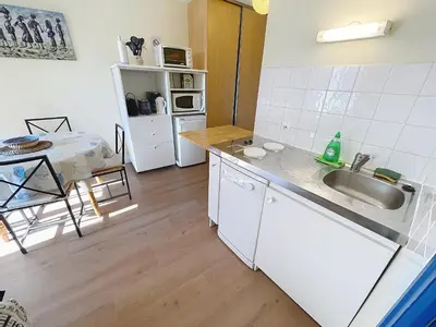 Cuisine ou kitchenette dans l'établissement Appartement T2 avec ascenseur, hypercentre, à 50m de la plage, WIFI, TV connectée, linge en option - FR-1-361-4