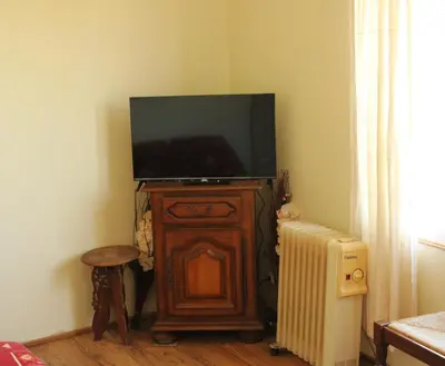 Télévision ou salle de divertissement dans l'établissement Villa La Gare