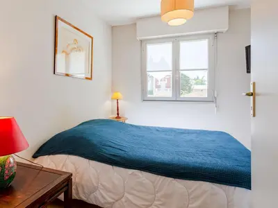 Un ou plusieurs lits dans un hébergement de l'établissement Apartment Les Terrasses du Casino-2 by Interhome