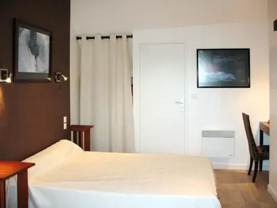 Un ou plusieurs lits dans un hébergement de l'établissement Holiday Home La Pailloussette by Interhome