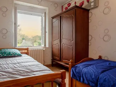 Un ou plusieurs lits dans un hébergement de l'établissement Holiday Home Les Mésanges by Interhome