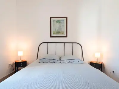 Un ou plusieurs lits dans un hébergement de l'établissement Holiday Home De Malau by Interhome