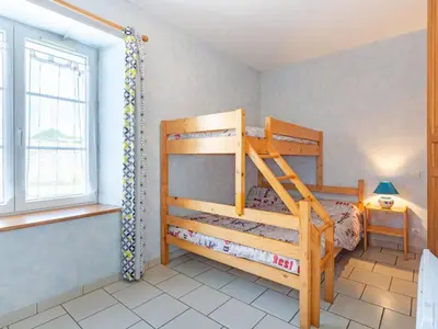 Un ou plusieurs lits dans un hébergement de l'établissement Holiday Home Le Plongeon by Interhome