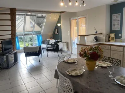 Coin salon dans l'établissement Holiday Home Côte des îles by Interhome
