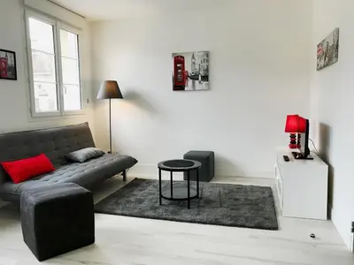 Coin salon dans l'établissement Appart'hôtel Chambrappart