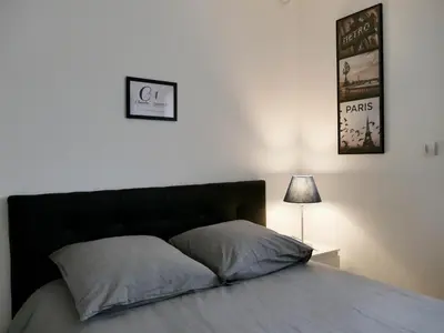 Un ou plusieurs lits dans un hébergement de l'établissement Appart'hôtel Chambrappart