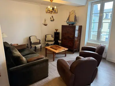 Coin salon dans l'établissement Fenêtres sur Mer Arromanches