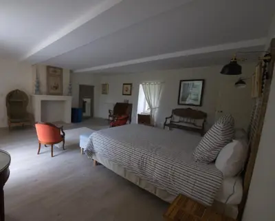 Coin salon dans l'établissement Le Manoir du Ribardon