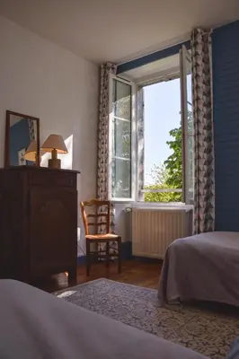 Un ou plusieurs lits dans un hébergement de l'établissement Utah Beach Chambre hote