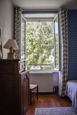 Un ou plusieurs lits dans un hébergement de l'établissement Utah Beach Chambre hote