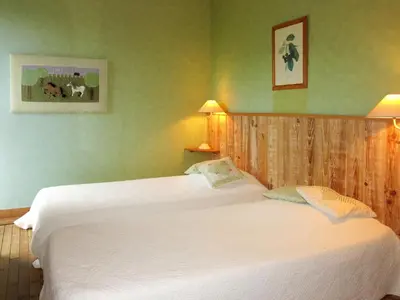 Un ou plusieurs lits dans un hébergement de l'établissement Holiday Home La Bedelle by Interhome