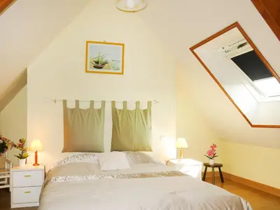 Un ou plusieurs lits dans un hébergement de l'établissement Holiday Home La Chevalerie by Interhome