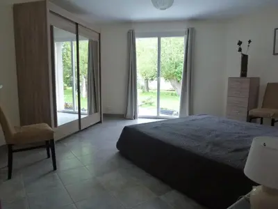 Un ou plusieurs lits dans un hébergement de l'établissement La maison verte