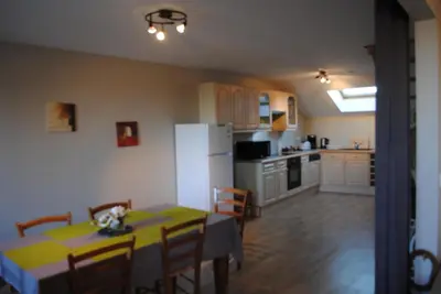 Cuisine ou kitchenette dans l'établissement Gite le Sainte Mère Eglise
