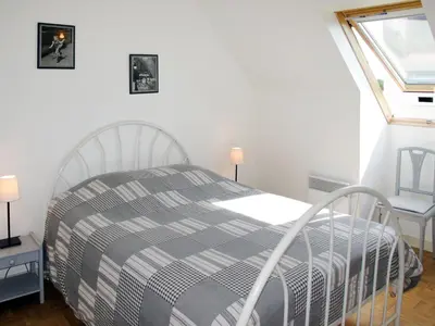 Un ou plusieurs lits dans un hébergement de l'établissement Holiday Home Neptune by Interhome