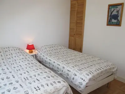 Un ou plusieurs lits dans un hébergement de l'établissement Holiday Home Neptune by Interhome