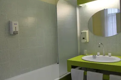 Salle de bains dans l'établissement Hotel Napoléon