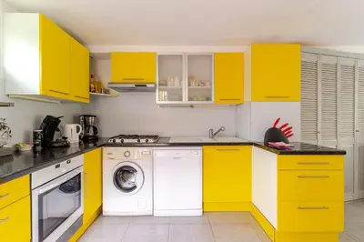Cuisine ou kitchenette dans l'établissement La Cornaline 1