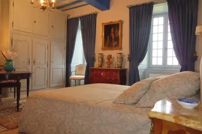Un ou plusieurs lits dans un hébergement de l'établissement Château de La Sémondière
