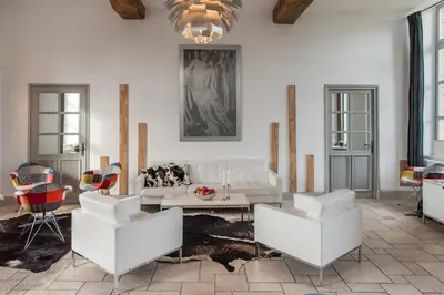 Coin salon dans l'établissement Château du Bois-Guy Golf