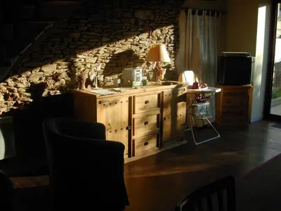Télévision ou salle de divertissement dans l'établissement la maison de Léa